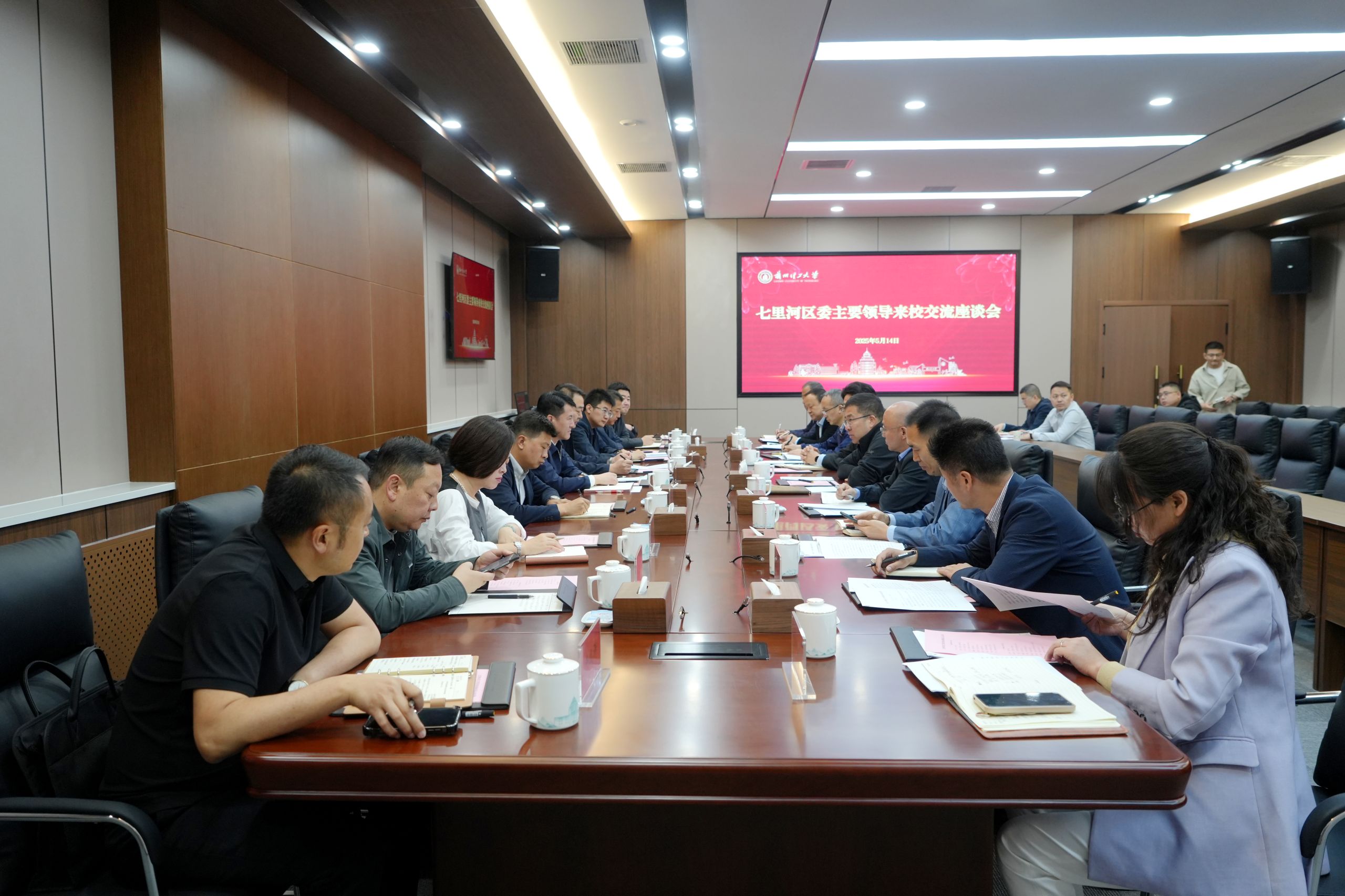 兰州市七里河区委书记胡真一行来校调研